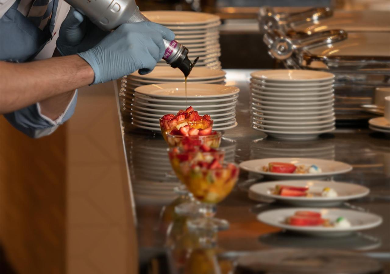 Crystal Inn Hotel - Alamein (Adults Only) El Alamein Exteriér fotografie A pastry chef finishing a dessert